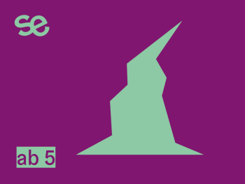 ein grüner Hexenhut auf einem lila Hintergrund