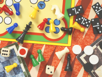 Copyright: Canva Farbige Spielbretter und Spielfiguren