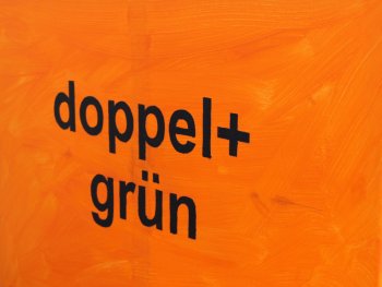 Copyright: Stephanie Grün Der Text doppel+grün in schwarz auf orangem Grund.