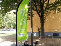 Beachflag mit Logo Der bewegte Stadtteil