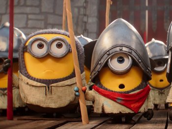 Copyright: 2026 Universal Pictures International Germany GmbH
Animierte Minions in mittelalterlichen Rüstungen und mit Speeren stehen als Wachen vor einer steinernen Burgmauer.