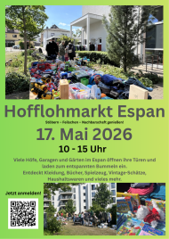 Tisch mit Spielzeug, Kleidung und Haushaltswaren vor einem Wohnhaus, mehrere Menschen im Hintergrund